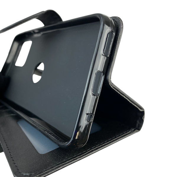 Чохол-книжка для телефона Motorola Moto E13 (PAXT0034) шкіряна з магнитною застібкою на моторола е13 чорна 0025227 фото