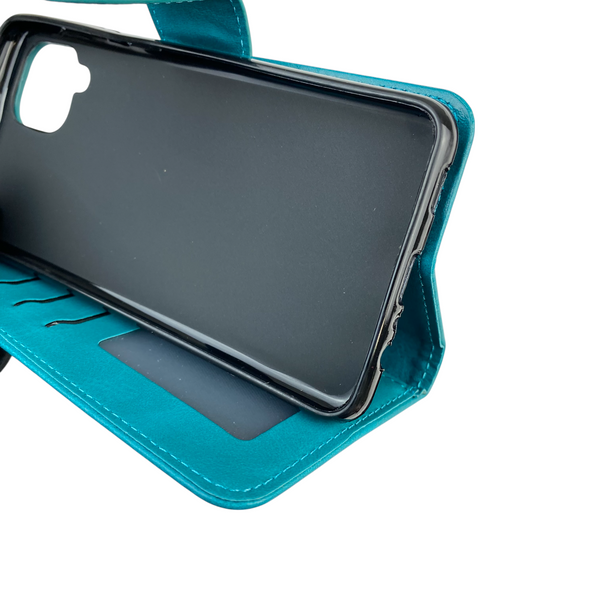 Чохол-книжка для телефона Samsung Galaxy A12 (SM-A127F) шкіряна з магнитною застібкою на самсунг а12 бірюзова 0025288 фото